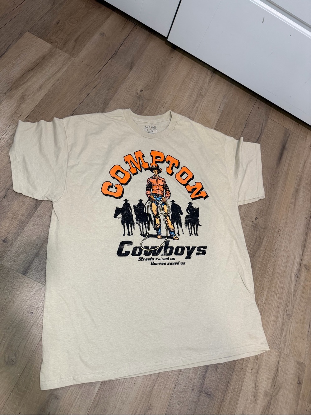 Compton Cowboys Graphic Short Sleeve Tee - Cream with Orange Print